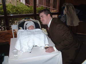 Baby Van and his daddy on christening day